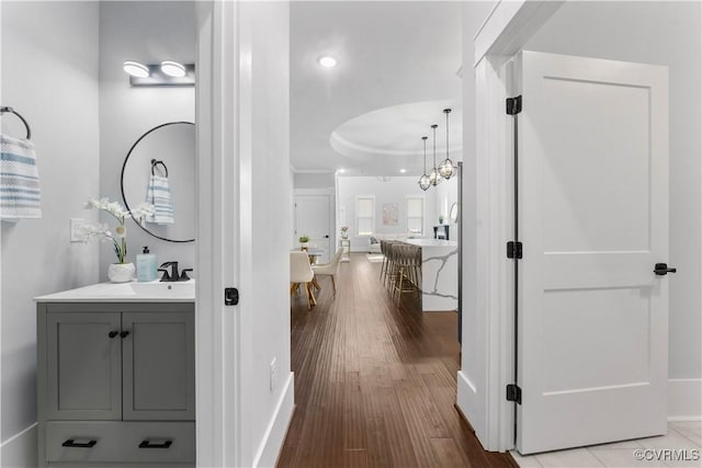 208 Minor St, Richmond, VA 23222 - corridor featuring wood finished floors, a chandelier, and recessed lighting