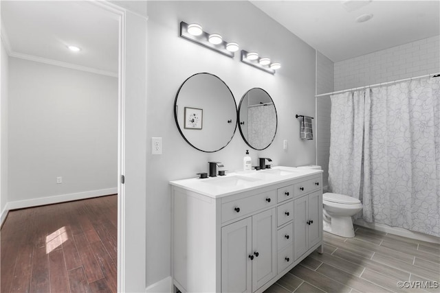 208 Minor St, Richmond, VA 23222 - bathroom with double vanity, wood finished floors, ornamental molding, and curtained shower