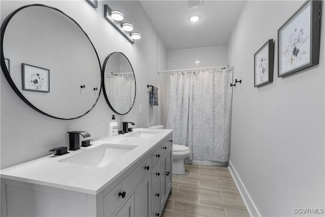 208 Minor St, Richmond, VA 23222 - bathroom featuring double vanity and a shower with curtain