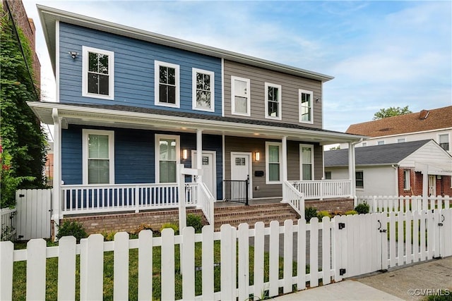208 Minor St, Richmond, VA 23222 - view of front of property with a porch, a gate, and a fenced front yard
