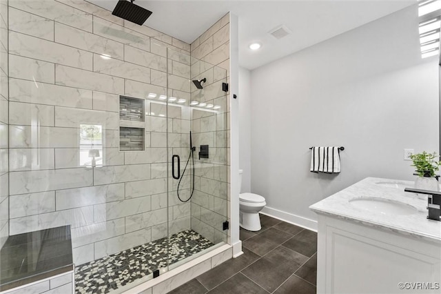 210 Minor St, Richmond, VA 23222 - full bathroom with a stall shower, double vanity, and tile patterned flooring