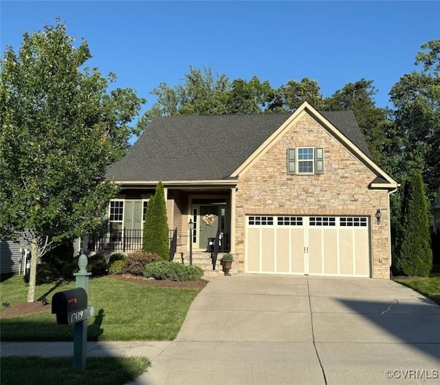 17419 Great Falls Cir, Moseley, VA 23120 - view of front of house with driveway, a front yard, and stone siding