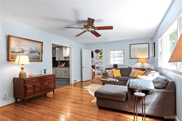 3942 Hickory Rd, Richmond, VA 23235 - living area with wood finished floors and ceiling fan