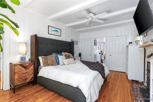 3942 Hickory Rd, Richmond, VA 23235 - bedroom with wood-type flooring, beam ceiling, ornamental molding, and a ceiling fan