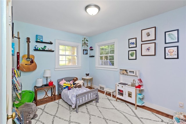 3942 Hickory Rd, Richmond, VA 23235 - bedroom featuring wood finished floors and baseboards