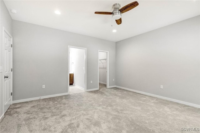 344 Land Or Dr, Ruther Glen, VA 22546 - unfurnished bedroom featuring carpet flooring, a spacious closet, recessed lighting, connected bathroom, and ceiling fan