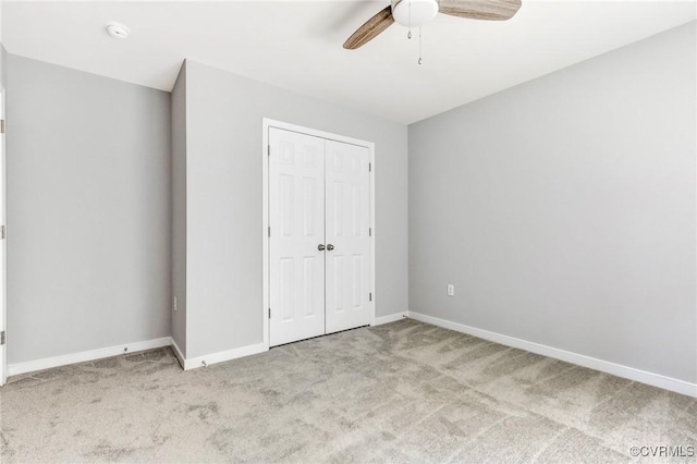 344 Land Or Dr, Ruther Glen, VA 22546 - unfurnished bedroom featuring carpet flooring, a closet, and a ceiling fan