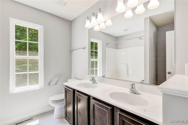 344 Land Or Dr, Ruther Glen, VA 22546 - full bath featuring healthy amount of natural light, double vanity, and a shower