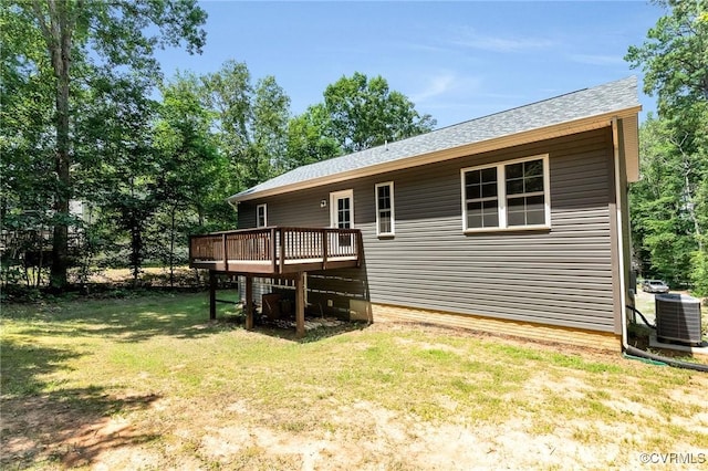 344 Land Or Dr, Ruther Glen, VA 22546 - rear view of house featuring a deck, a lawn, and roof with shingles