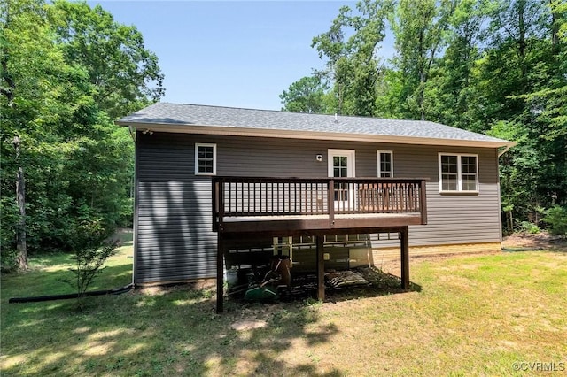 344 Land Or Dr, Ruther Glen, VA 22546 - back of property with a deck, a yard, and a shingled roof
