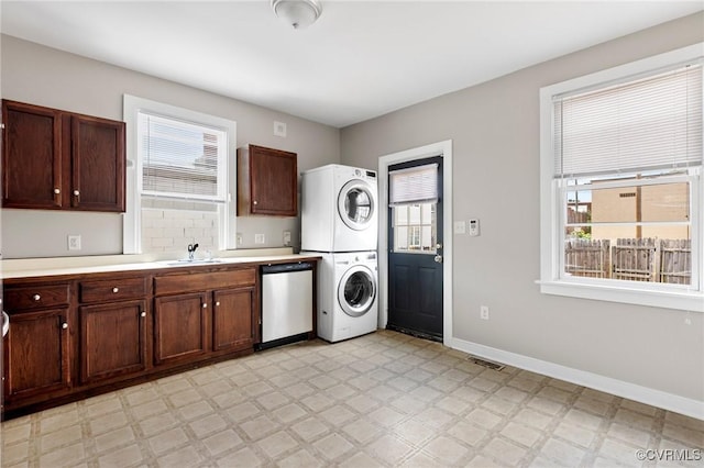 20 S Lombardy St, Richmond, VA 23220 - washroom featuring estacked washer and dryer and light flooring