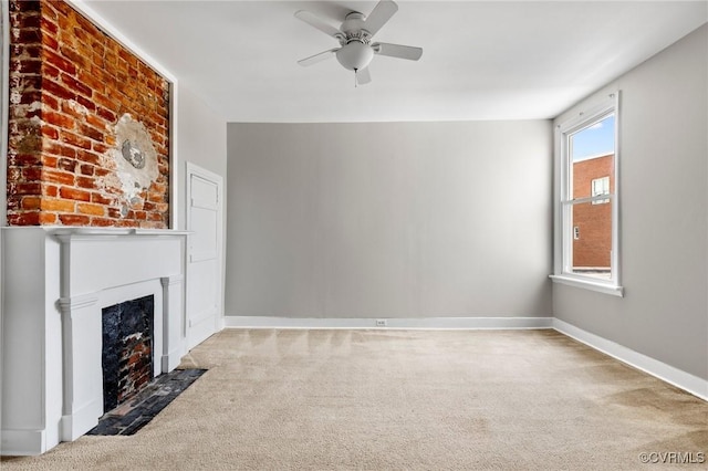20 S Lombardy St, Richmond, VA 23220 - unfurnished living room featuring light carpet, a ceiling fan, and a fireplace with flush hearth
