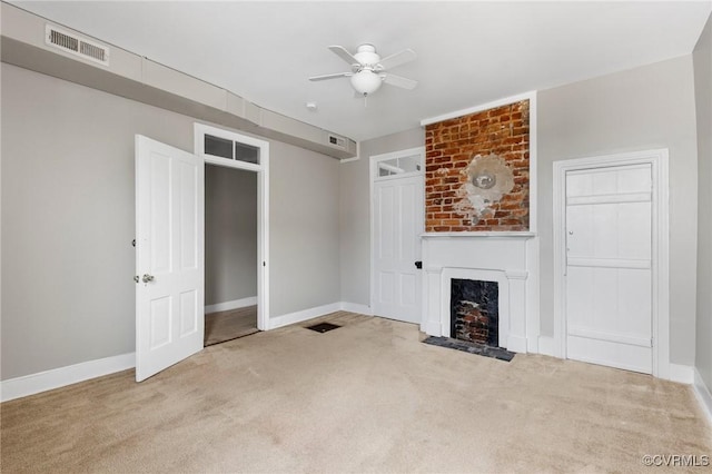 20 S Lombardy St, Richmond, VA 23220 - unfurnished living room featuring carpet flooring, ceiling fan, and a large fireplace
