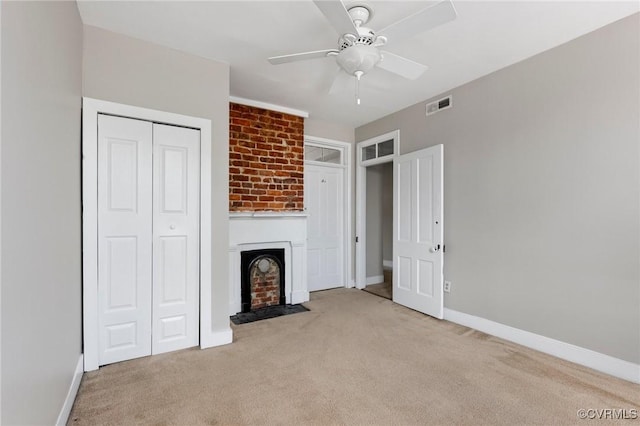 20 S Lombardy St, Richmond, VA 23220 - unfurnished living room featuring carpet flooring, a large fireplace, and a ceiling fan