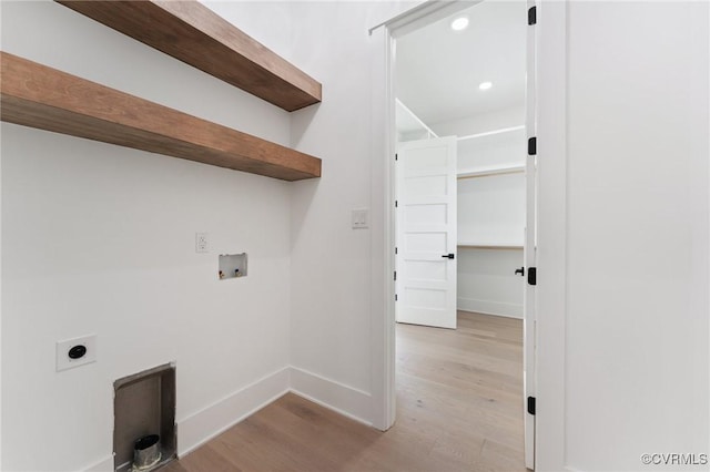 7241 Amarone Way, New Kent, VA 23124 - laundry room featuring hookup for an electric dryer, hookup for a washing machine, light wood-style floors, and recessed lighting