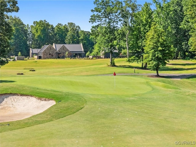 7241 Amarone Way, New Kent, VA 23124 - view of community featuring a yard, view of golf course, and view of scattered trees