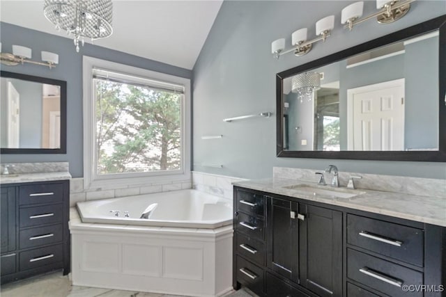 3608 Tyverton Ct, Henrico, VA 23233 - bathroom with vaulted ceiling, a chandelier, two vanities, a bath, and a shower