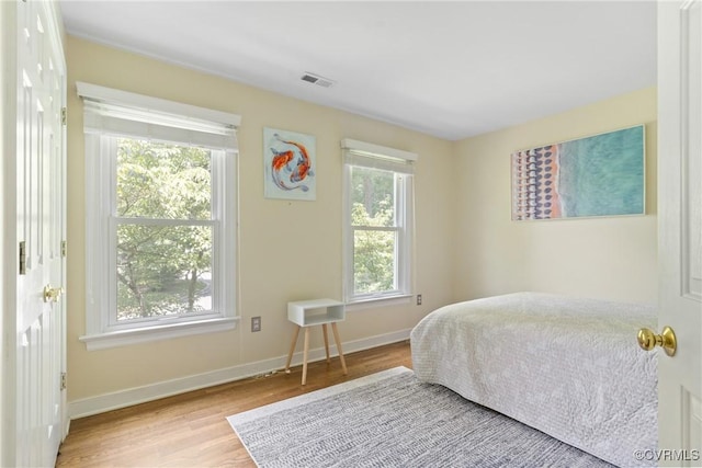 3608 Tyverton Ct, Henrico, VA 23233 - bedroom featuring wood finished floors and baseboards