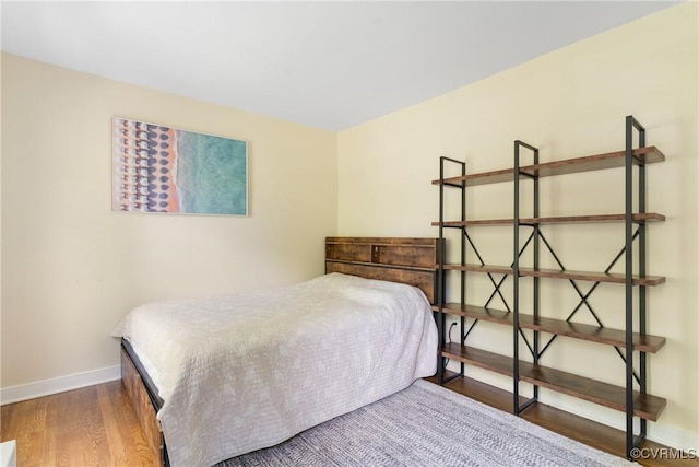 3608 Tyverton Ct, Henrico, VA 23233 - bedroom featuring baseboards and wood finished floors