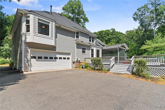 3608 Tyverton Ct, Henrico, VA 23233 - view of front of property with a garage, a wooden deck, and driveway