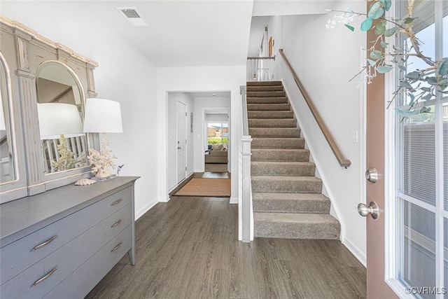 585 Rivanna Hill Rd, Glen Allen, VA 23060 - foyer featuring dark wood finished floors, stairway, and plenty of natural light