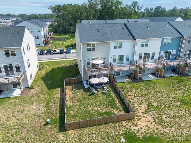 585 Rivanna Hill Rd, Glen Allen, VA 23060 - back of house featuring a residential view, a lawn, and a deck