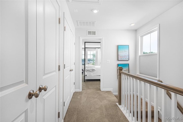 585 Rivanna Hill Rd, Glen Allen, VA 23060 - corridor featuring light carpet, an upstairs landing, and recessed lighting