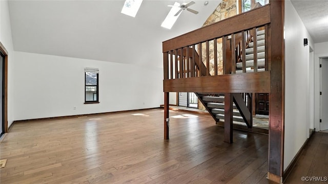 636 Spirea Rd, North Chesterfield, VA 23236 - interior space featuring hardwood / wood-style flooring, healthy amount of natural light, ceiling fan, a skylight, and high vaulted ceiling