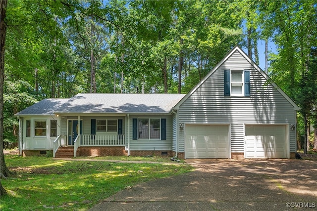 102 Penrith Ct, Williamsburg, VA 23185 - view of front of home with covered porch, crawl space, asphalt driveway, and a front lawn