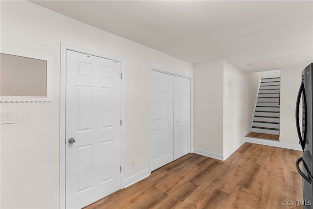 102 Penrith Ct, Williamsburg, VA 23185 - foyer entrance with light wood-style floors and stairway