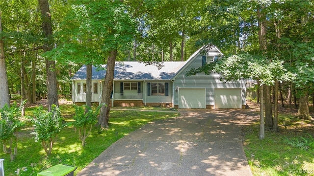 102 Penrith Ct, Williamsburg, VA 23185 - view of front of property featuring asphalt driveway, a porch, crawl space, roof with shingles, and a front yard