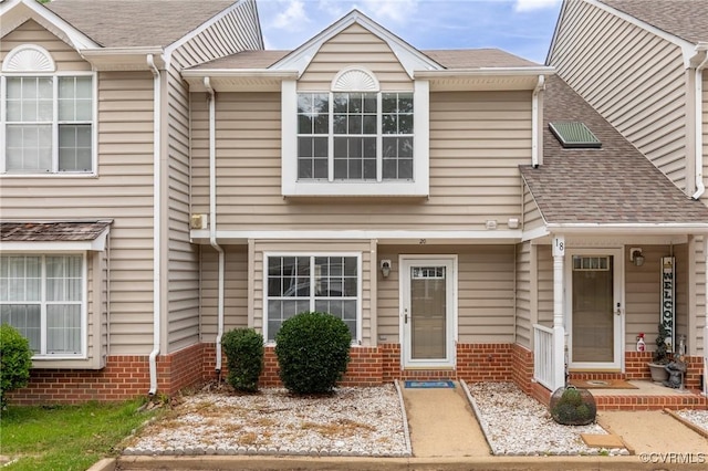20 Madrone Pl, Hampton, VA 23666 - townhome / multi-family property featuring brick siding and roof with shingles