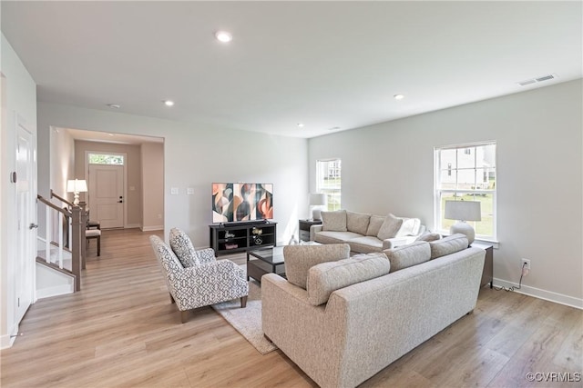 14106 Botsford Ave, Chesterfield, VA 23831 - living room featuring light wood finished floors, stairs, and recessed lighting