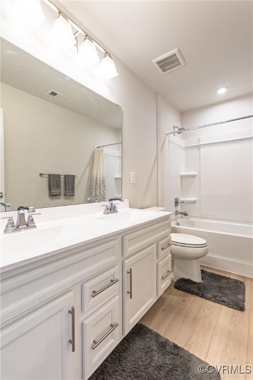 14106 Botsford Ave, Chesterfield, VA 23831 - bathroom with double vanity, shower / bath combo with shower curtain, and wood finished floors