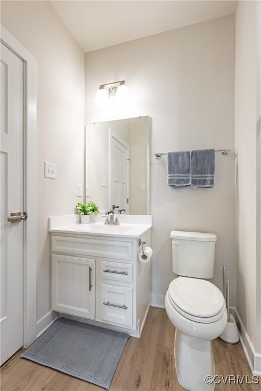 14106 Botsford Ave, Chesterfield, VA 23831 - half bath with wood finished floors and vanity