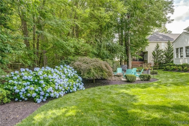 3731 Rivermist Ter, Midlothian, VA 23113 - view of grassy yard with an outdoor fire pit