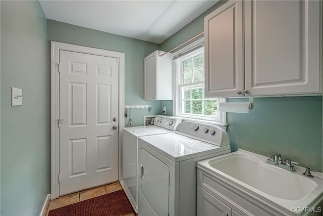 3731 Rivermist Ter, Midlothian, VA 23113 - laundry area with washing machine and dryer, cabinet space, and light tile patterned floors