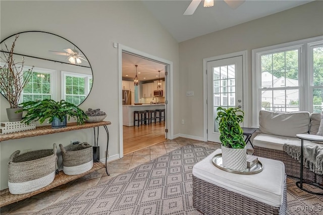 3731 Rivermist Ter, Midlothian, VA 23113 - living area featuring a ceiling fan, lofted ceiling, and light tile patterned floors