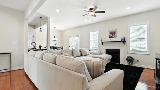 3809 Crows Nest Ct, Hopewell, VA 23860 - living room with ceiling fan, wood finished floors, a fireplace, and recessed lighting