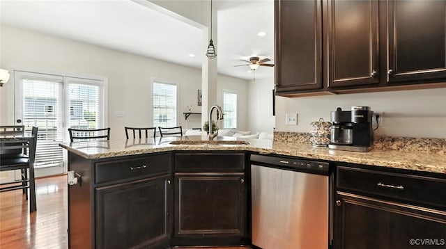 3809 Crows Nest Ct, Hopewell, VA 23860 - kitchen with stainless steel dishwasher, a peninsula, ceiling fan, light stone counters, and recessed lighting
