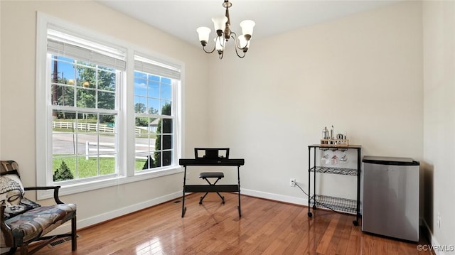3809 Crows Nest Ct, Hopewell, VA 23860 - living area featuring a chandelier and wood finished floors