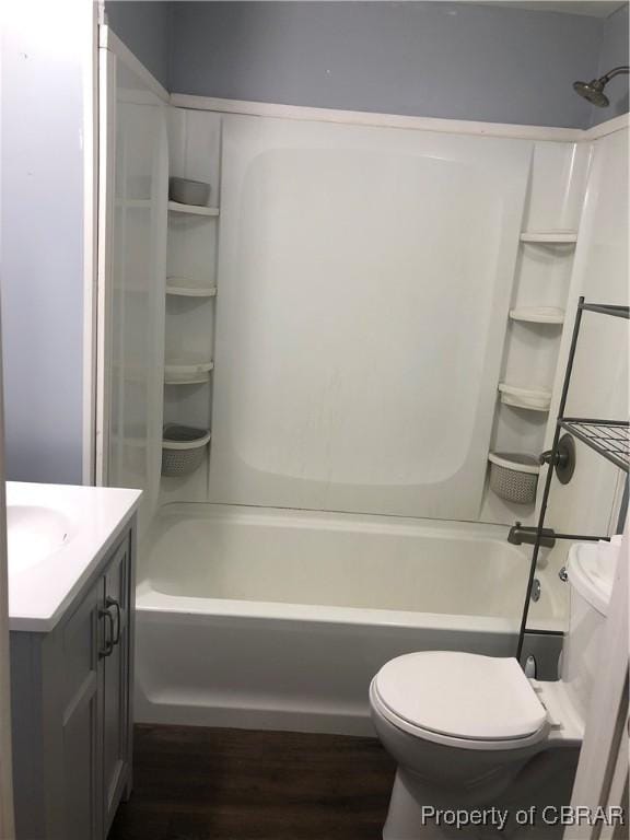 271 Bendall Ln, Mathews, VA 23109 - bathroom with vanity, wood finished floors, and shower / bathtub combination