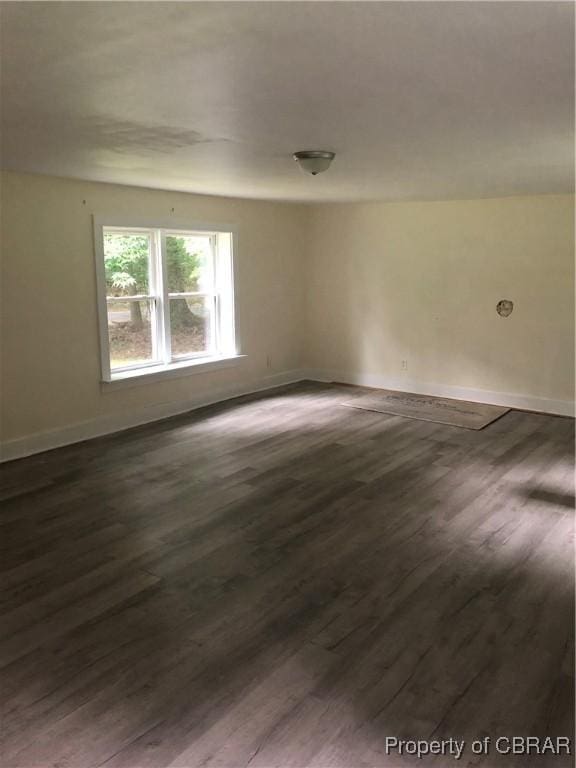 271 Bendall Ln, Mathews, VA 23109 - spare room featuring dark wood-type flooring