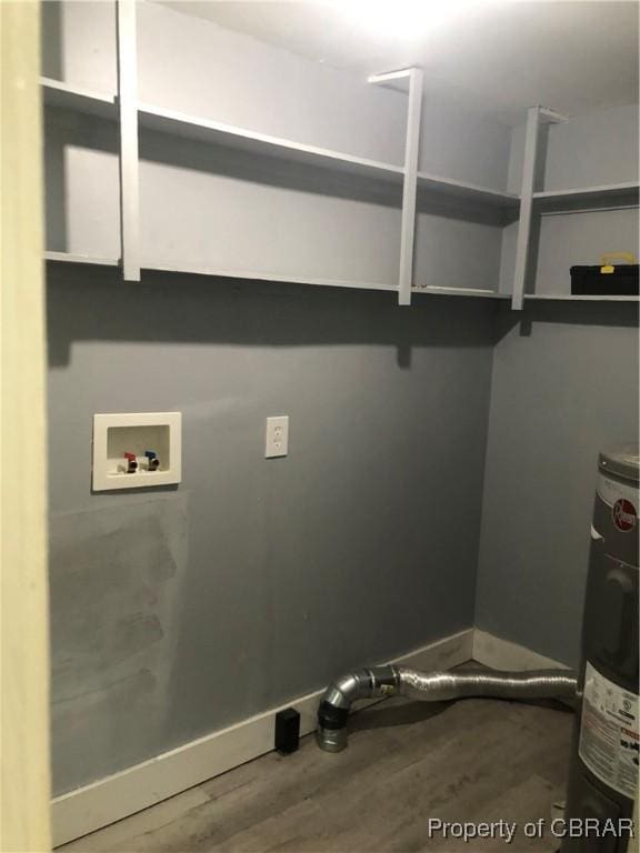 271 Bendall Ln, Mathews, VA 23109 - laundry room with hookup for a washing machine, wood finished floors, and water heater