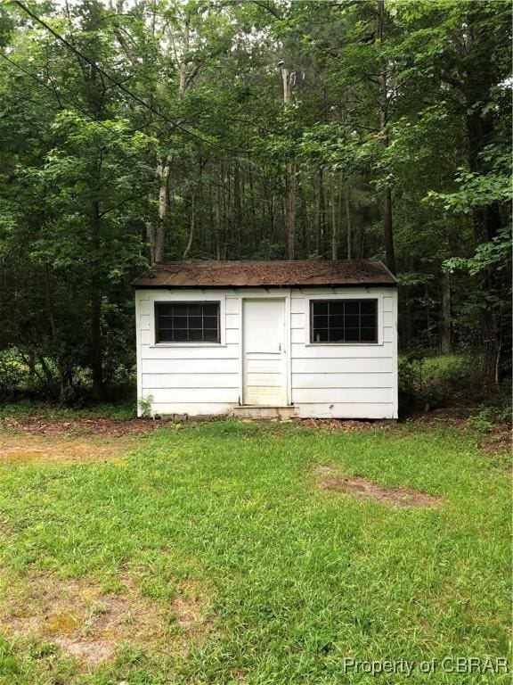 271 Bendall Ln, Mathews, VA 23109 - view of shed with a forest view