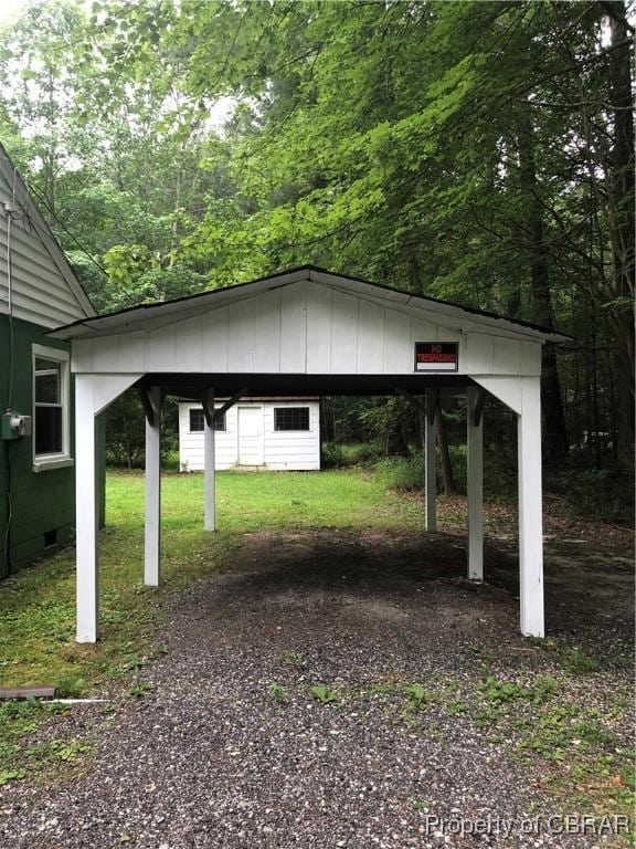 271 Bendall Ln, Mathews, VA 23109 - view of outdoor structure featuring gravel driveway