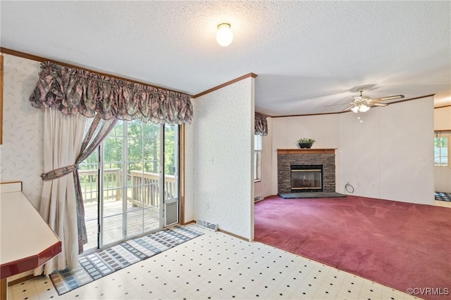 4867 Tabscott Rd, Kents Store, VA 23084 - unfurnished living room with crown molding, a ceiling fan, a fireplace, tile patterned floors, and a textured ceiling