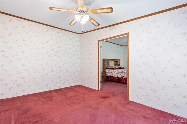4867 Tabscott Rd, Kents Store, VA 23084 - carpeted empty room featuring ornamental molding, wallpapered walls, and ceiling fan