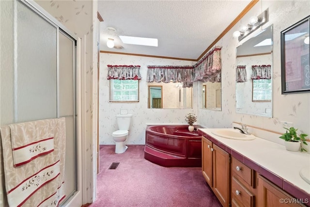 4867 Tabscott Rd, Kents Store, VA 23084 - full bathroom featuring a textured ceiling, a shower stall, double vanity, a garden tub, and ornamental molding