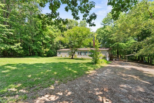 4867 Tabscott Rd, Kents Store, VA 23084 - view of grassy yard with dirt driveway